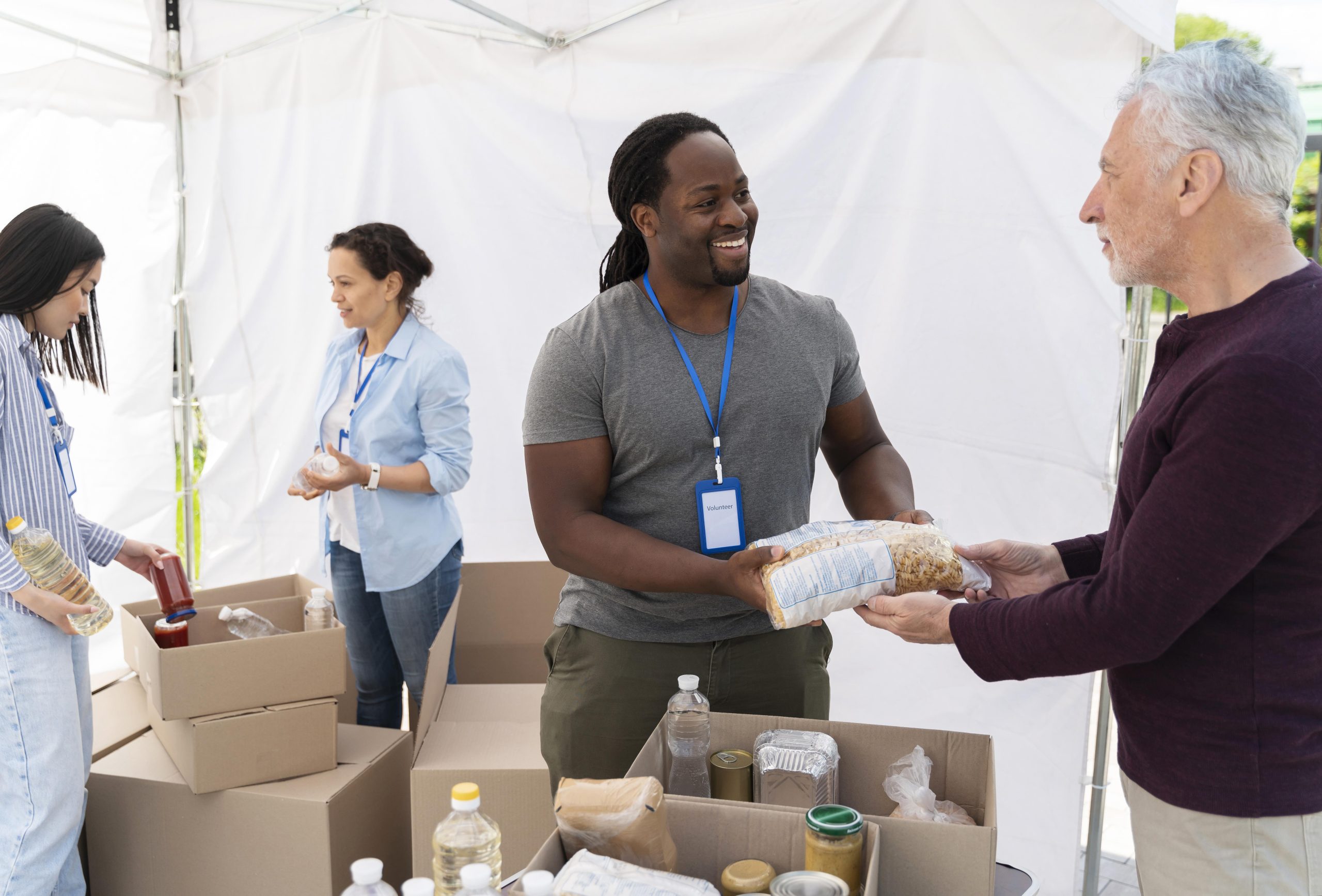 people doing volunteer work foodbank