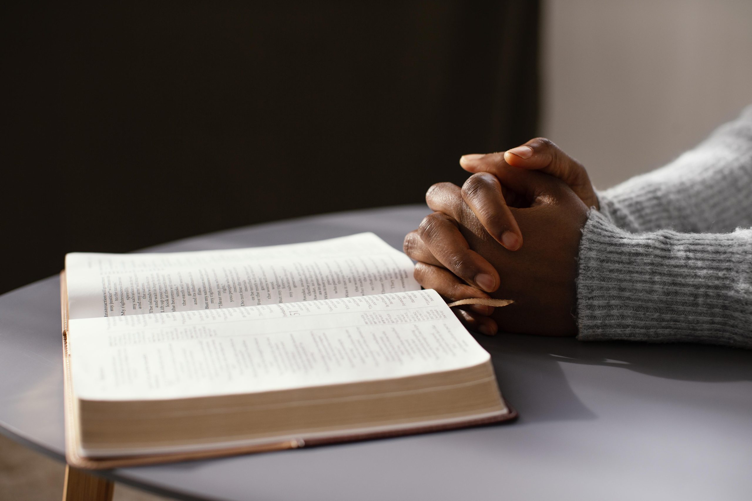 woman praying her loved ones