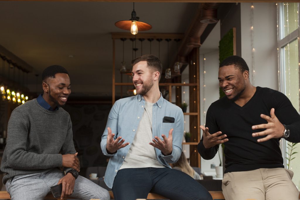 low angle males having good time